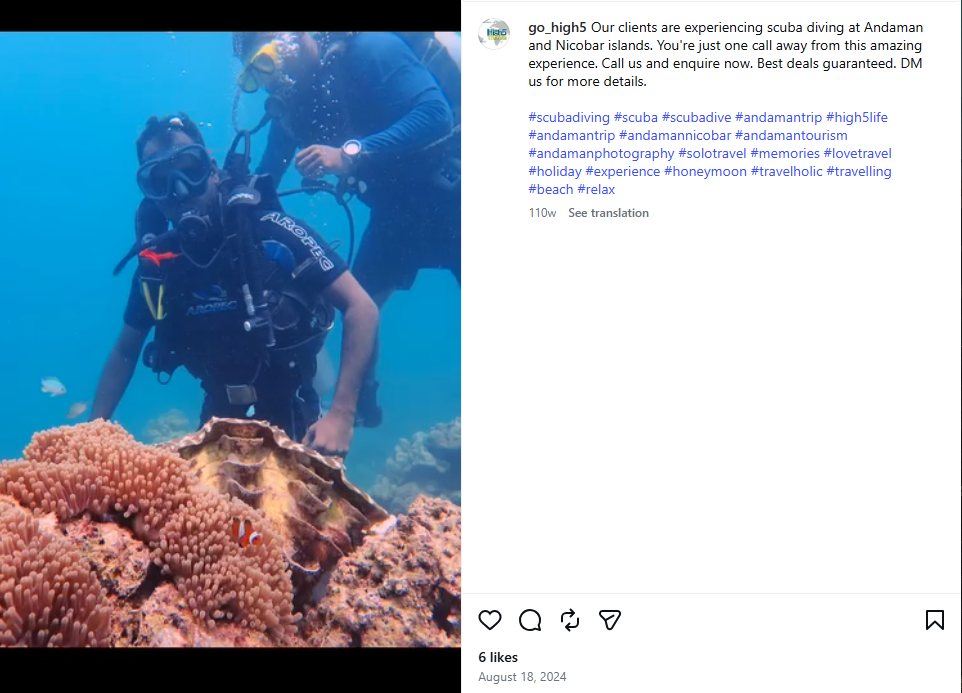 Instagram post of travellers scuba diving over coral in the Andaman Islands
